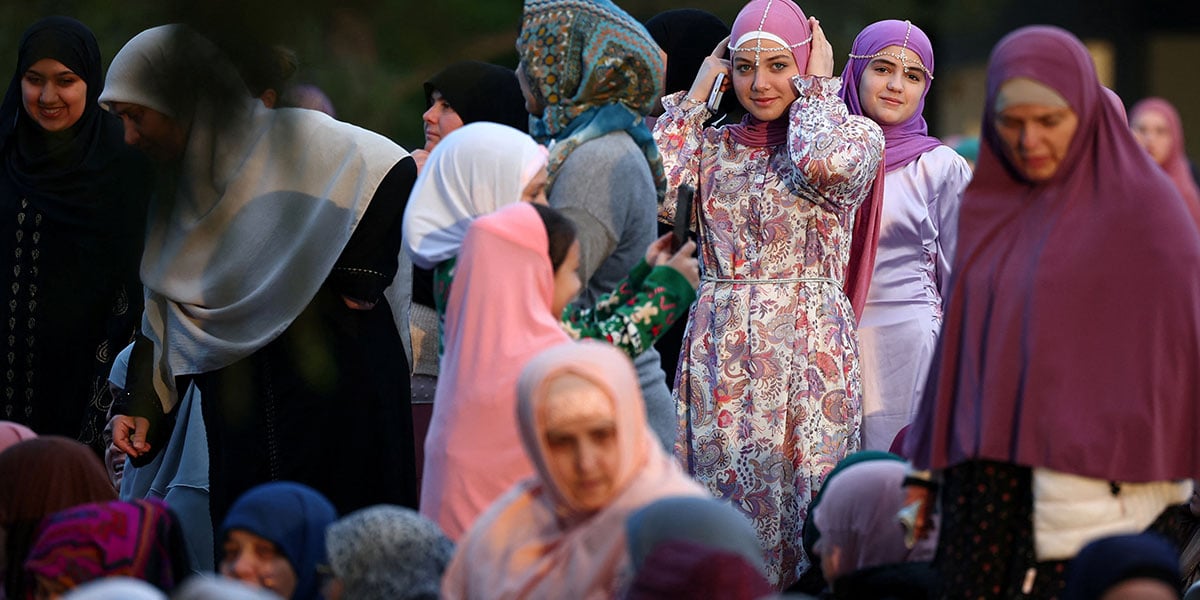 Albanian Muslims react before the prayer of the UL FITR Aid in Skanderbeg Square, in Tirana, Albania, March 30, 2025. - Reuters