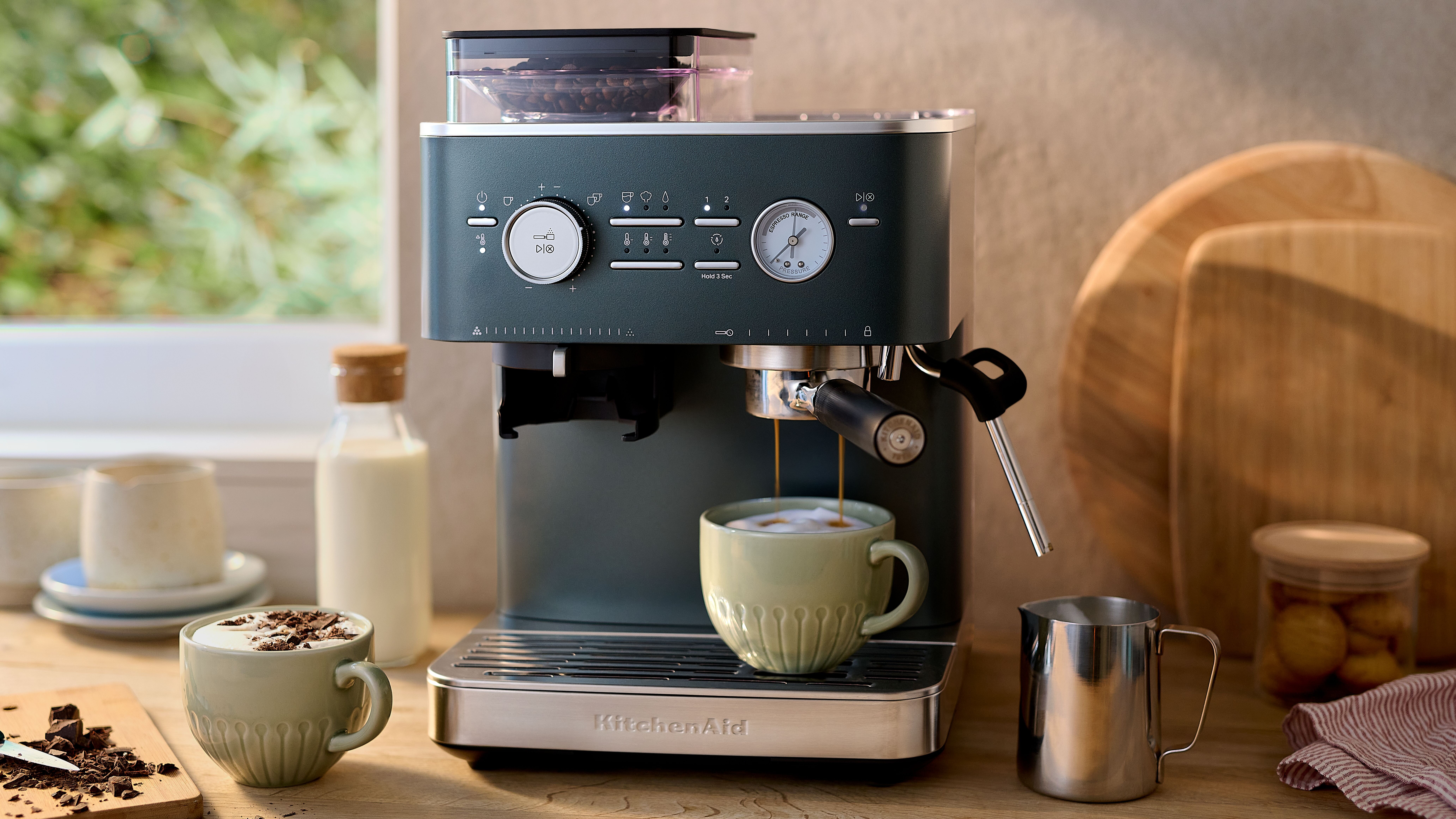 Semi-automatic espresso machine kitchenaid in green juniper on kitchen counter