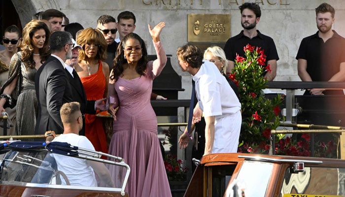 The American journalist Gayle King (left), the American television host Oprah Winfrey leaves the Hotel Gritti Palace on the Wedding Day of the founder of Amazon Jeff Bezos with Lauren Sanchez, in Venice on June 27, 2025. - AFP