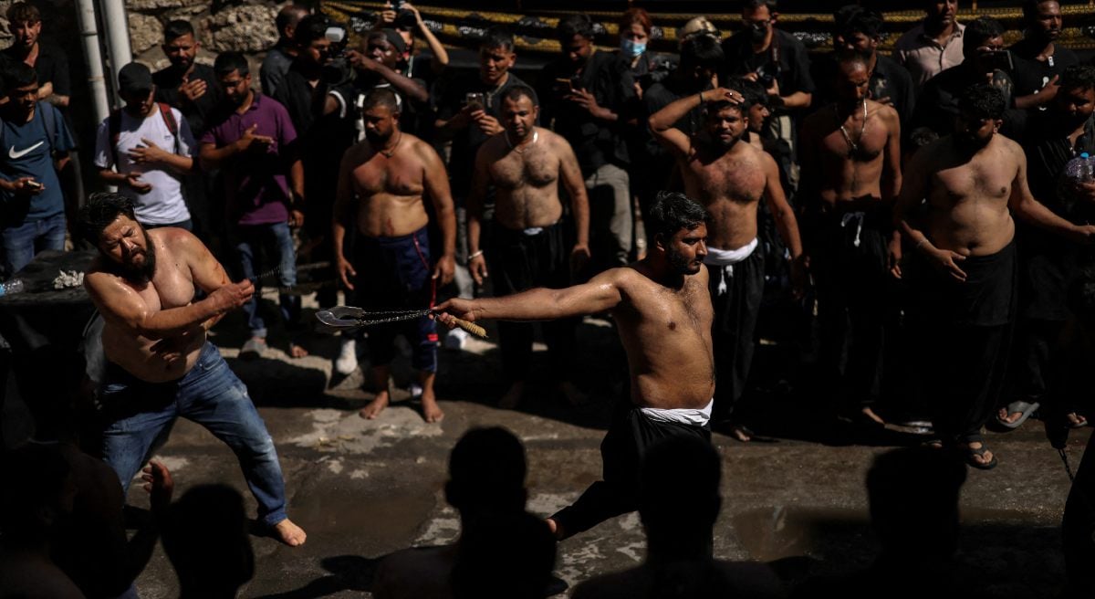 People in mourning living in Greece fuck themselves during a Muharram procession in Mark Ashura, Piraeus, Greece, July 6, 2025. - Reuters