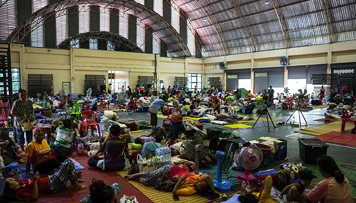 People rest in a refuge, after Thailand and Cambodia exchanged heavy artillery in Surin, Thailand, July 25, 2025. - Reuters