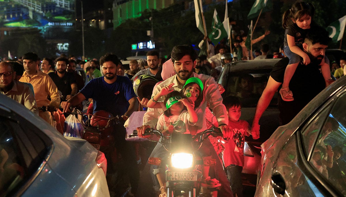 People participate in the celebration of the independence day in Lahore on August 14, 2025. - Reuters