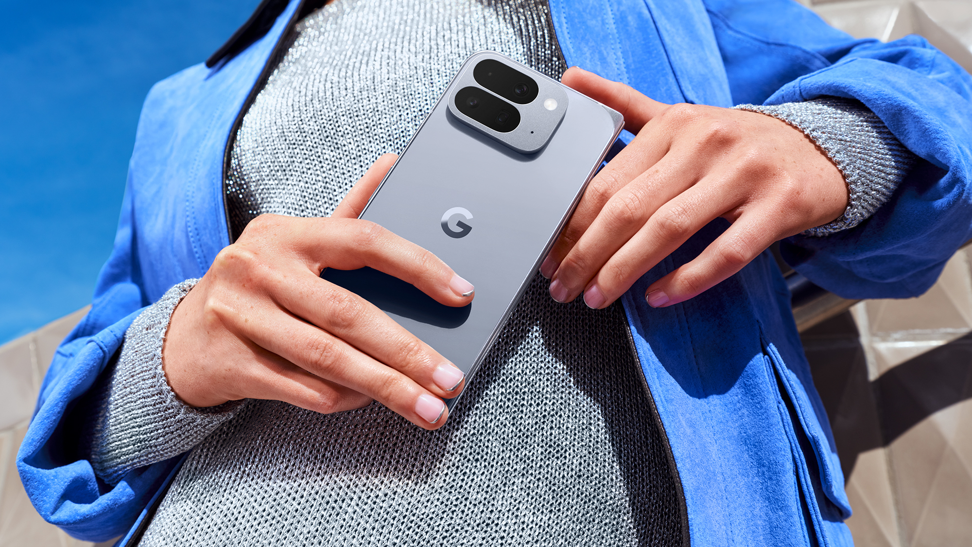 Two hands holding the phone Google Pixel 10 Pro Fold