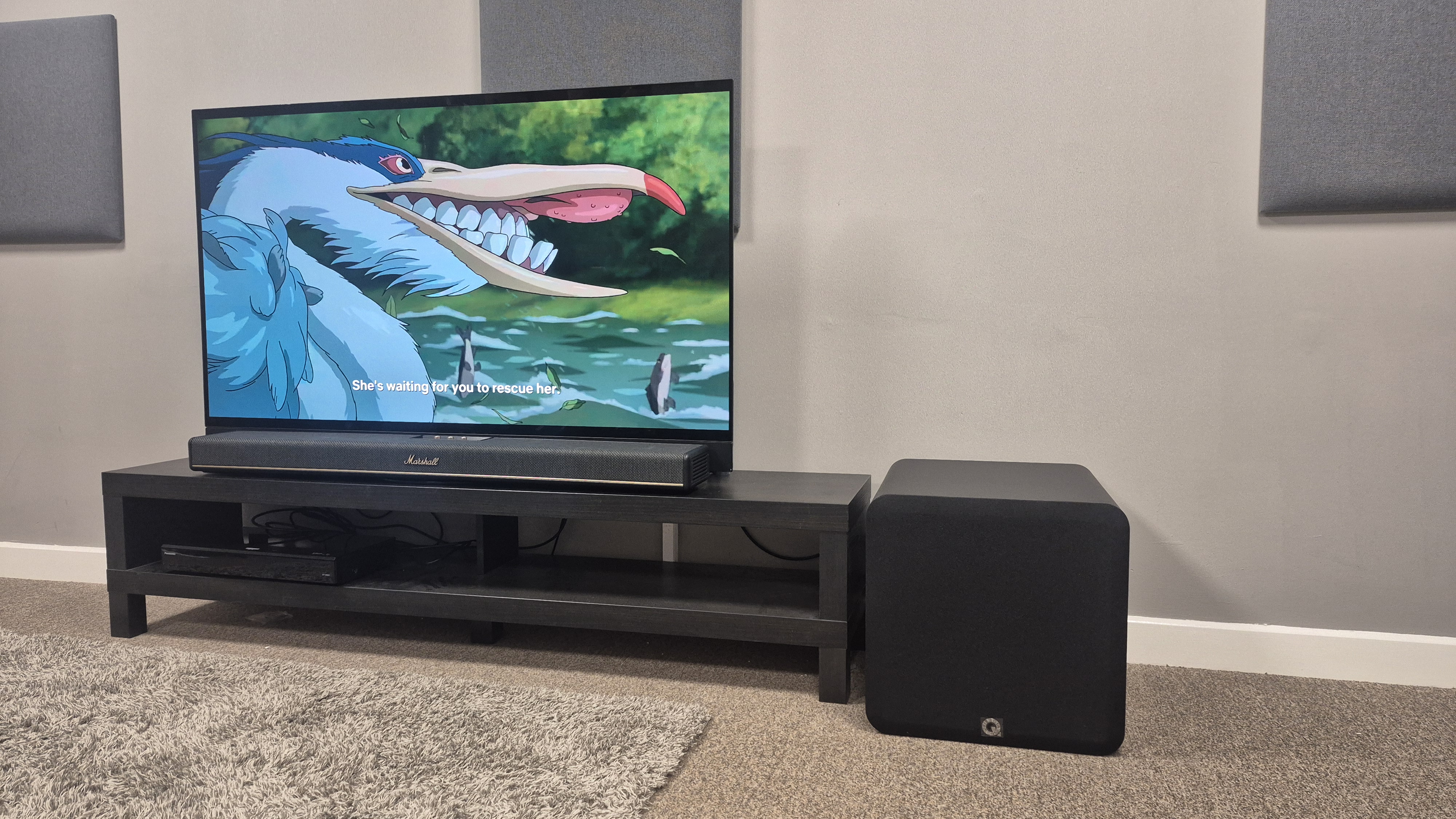 Q Acoustics Q in less than 120 next to Marshall Heston 120 with television playing the boy and the heron