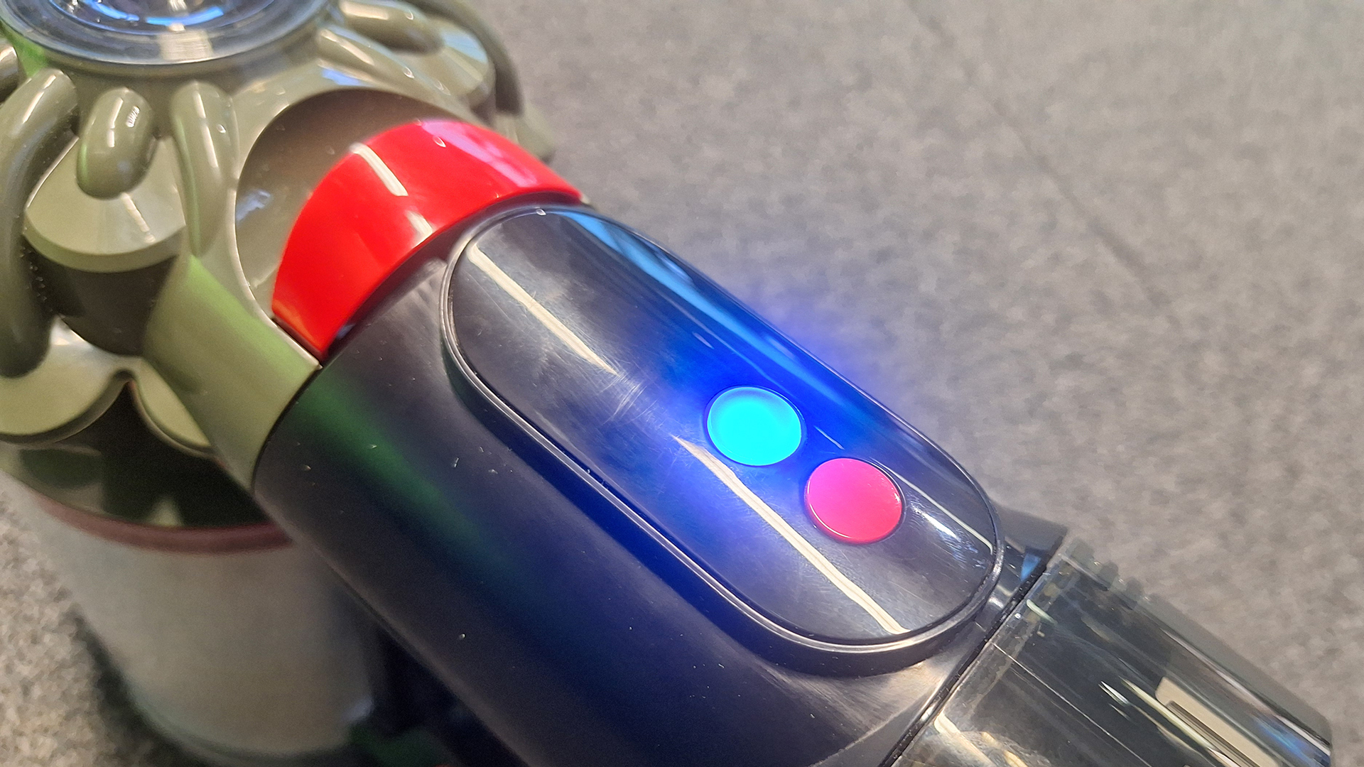 On the button on Dyson V8 Cyclone Vacuum