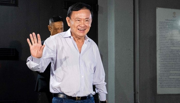 Former Thai Prime Minister Thaksin Shinawatra left the headquarters of the Thai party in Bangkok on August 29, 2025. - AFP