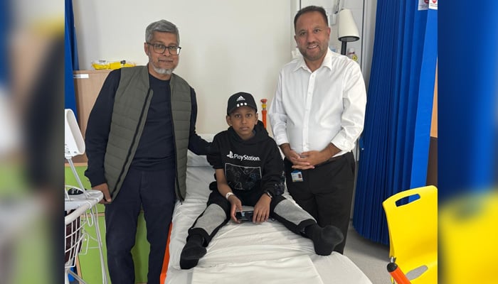 Dr. Sher Bahadur Anjum, British-Pakistani (right), originally from Gilgit Baltistan, is with a Thalasemia patient after their successful gene therapy treatment. - Postpone