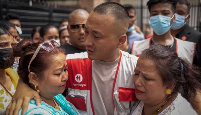 Sudan Gurung, 36, founder of Hami Nepal, cried after meeting members of the family of victims, who died after the last weeks of anti -corruption deadly demonstrations, outside a morgue in a hospital, in Kathmandu, Nepal, September 13, 2025.