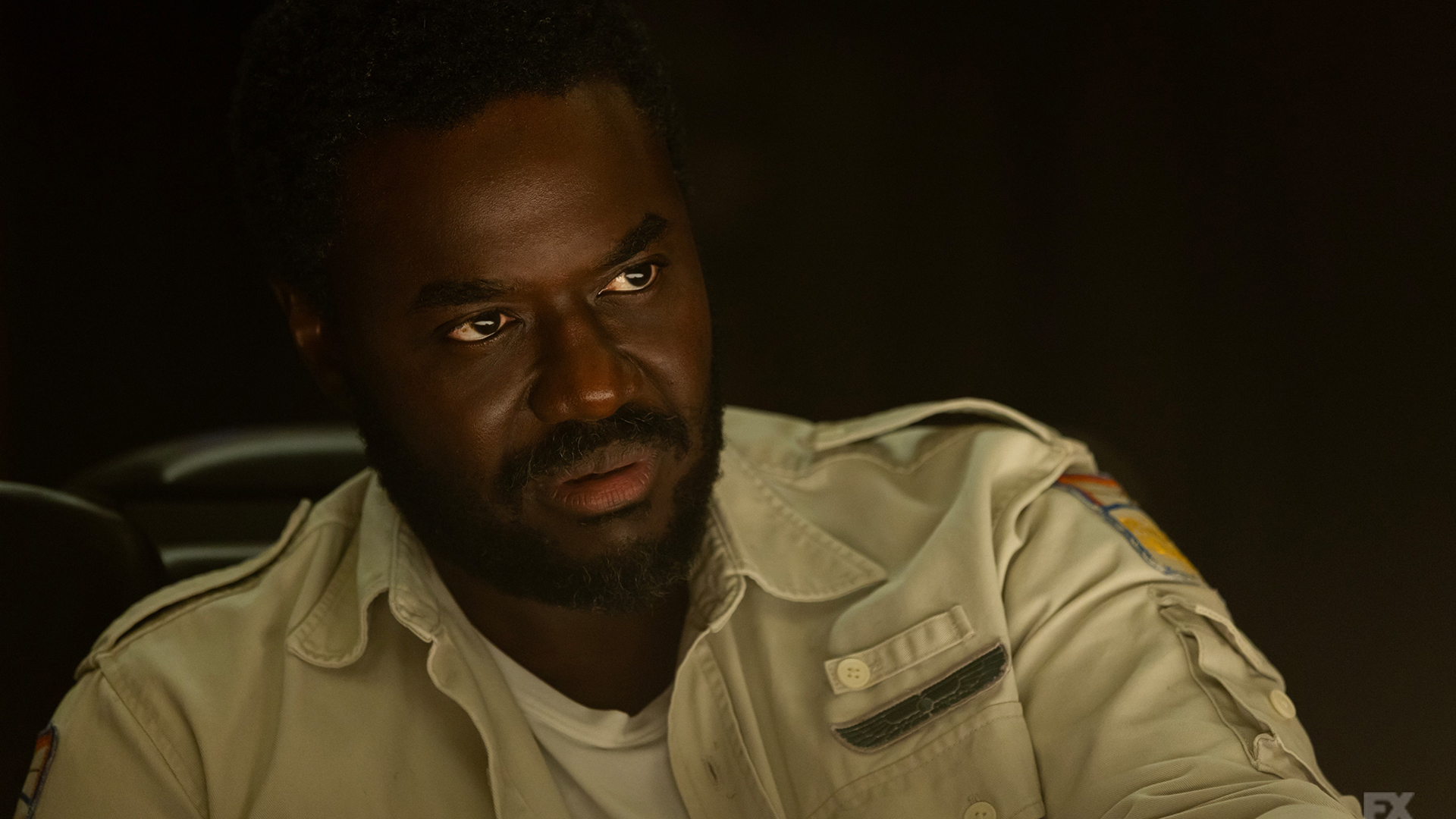 A close -up of Morrow sitting in Alien: Earth Episode 5