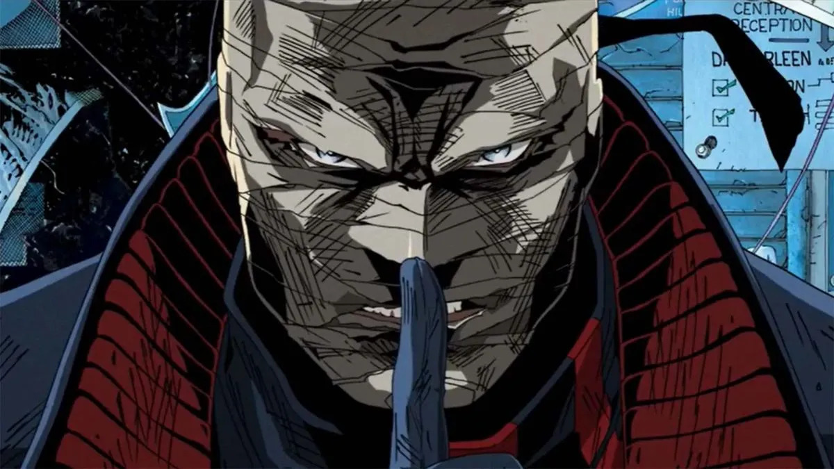 A close -up of the villain Batman Hush in a DC comic strip