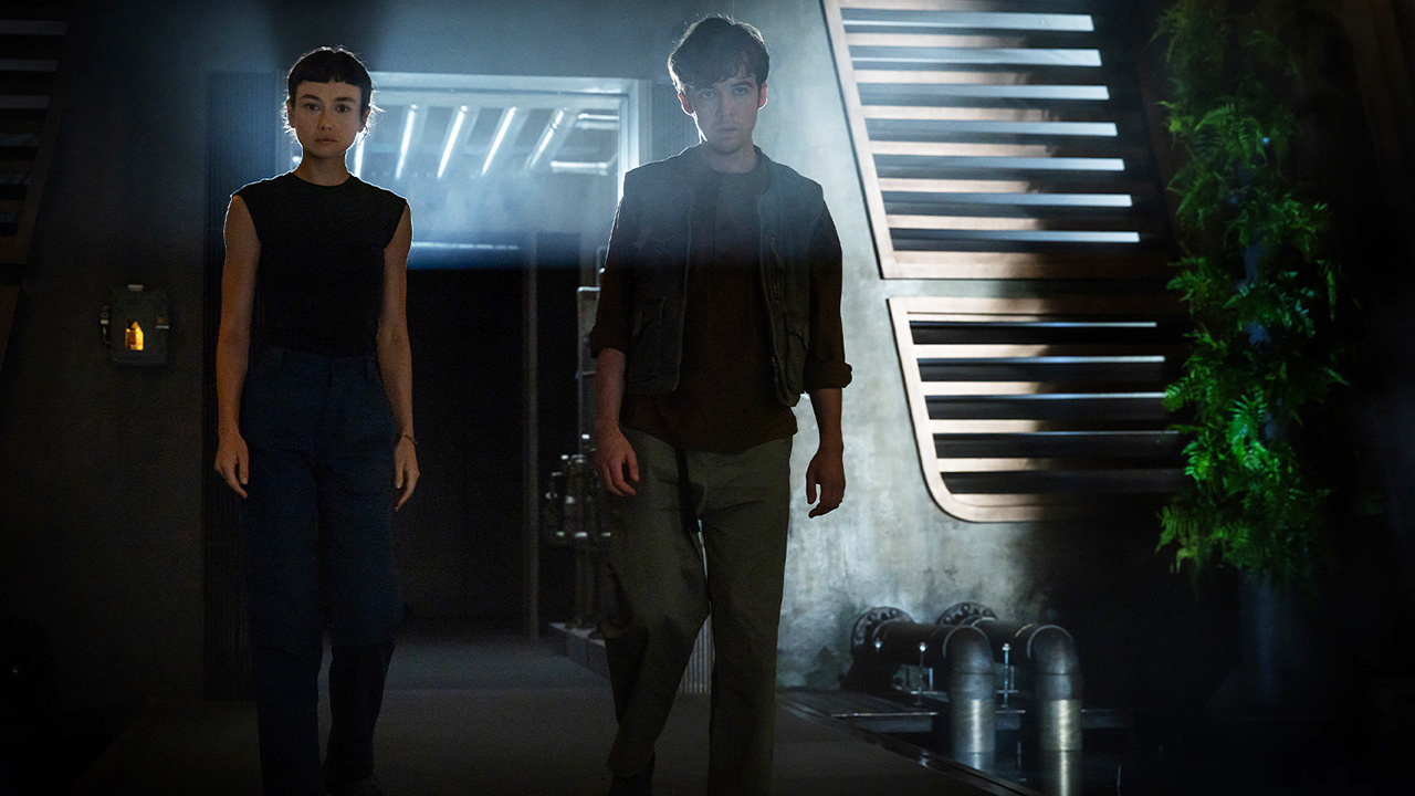 Wendy and Joe held in a room weakly lit in Alien: Earth Season 1 Episode 8