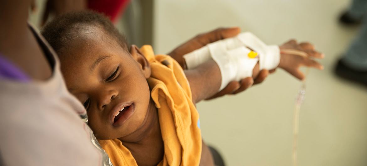 A young child is treated for cholera in a hospital in Port-au-Prince, Haiti.