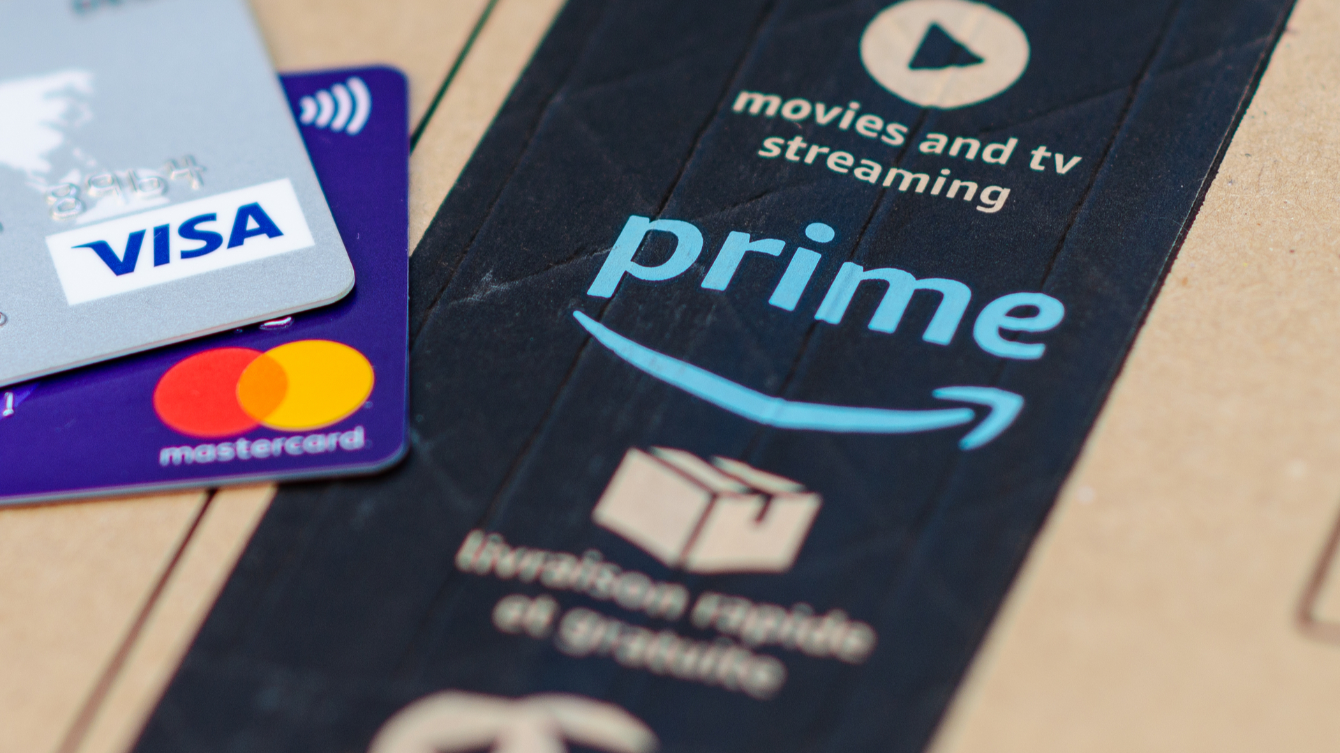 Amazon prime package with two credit cards at the top