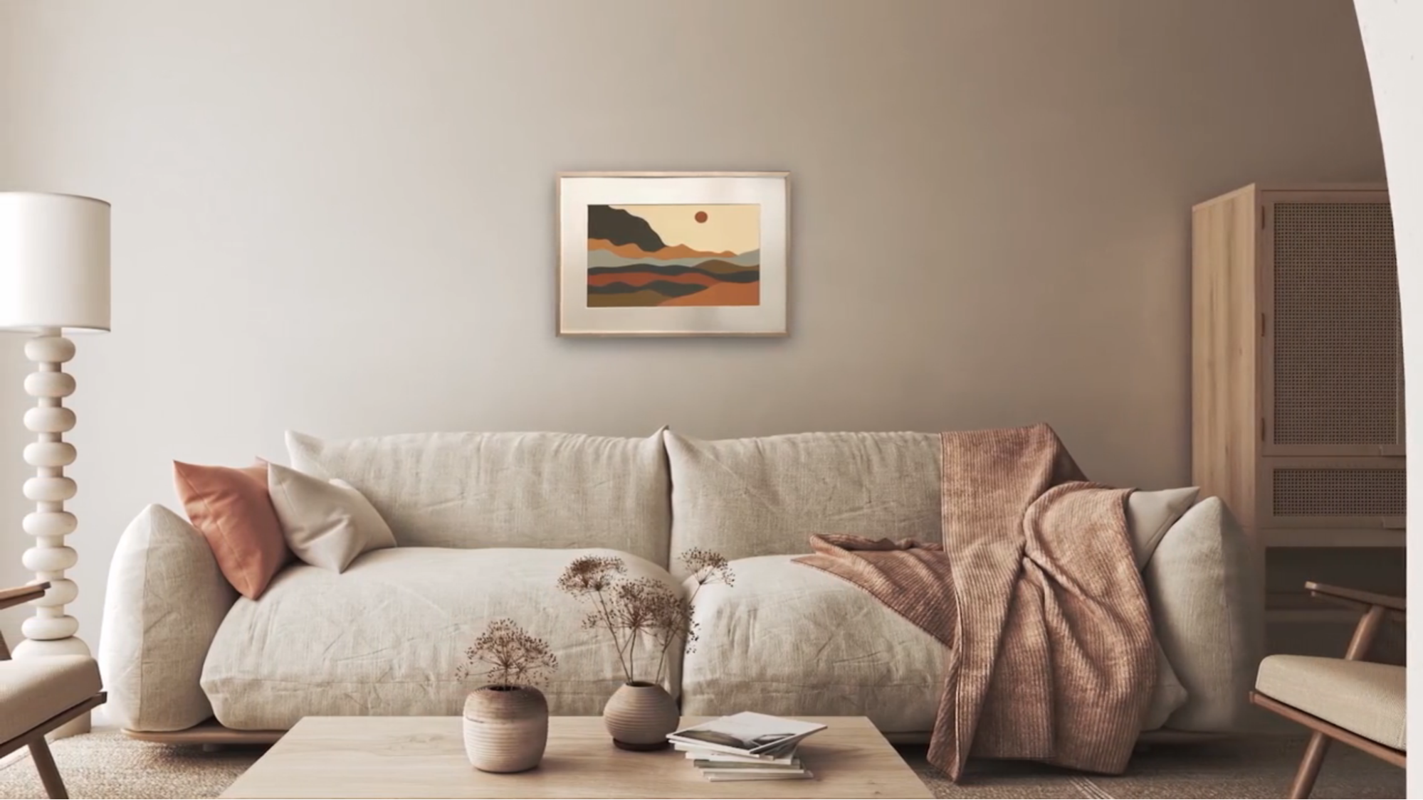 A living room wall showing an intelligent image frame above a sofa