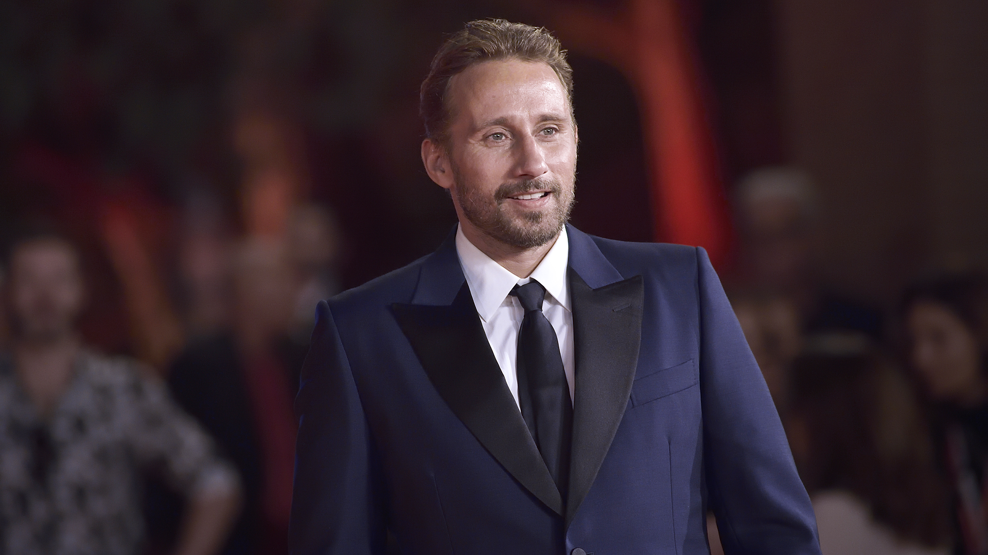 Matthias Schoenaerts posting for photographs at the Rome Film Festival 2022