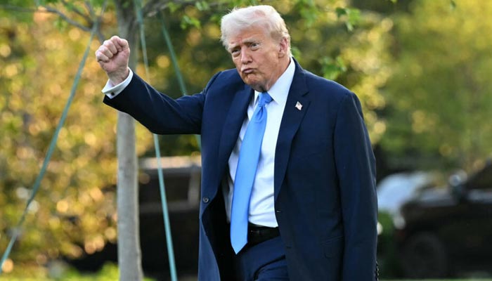 Donald Trump gestures during an event in this undated image. -AFP