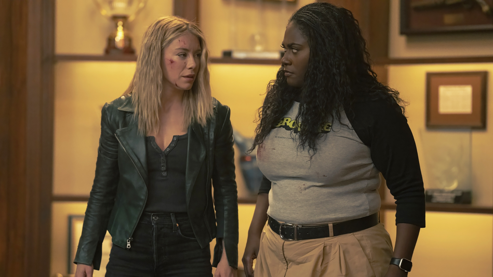 Emilia Harcourt and Leota Adebayo look at each other in episode 7 of season 2 of Peacemaker