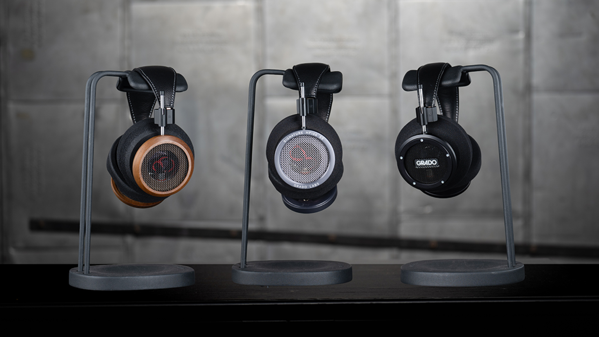 The Grado Signature S750 on a stand, with the other two signature models on stands to its left.
