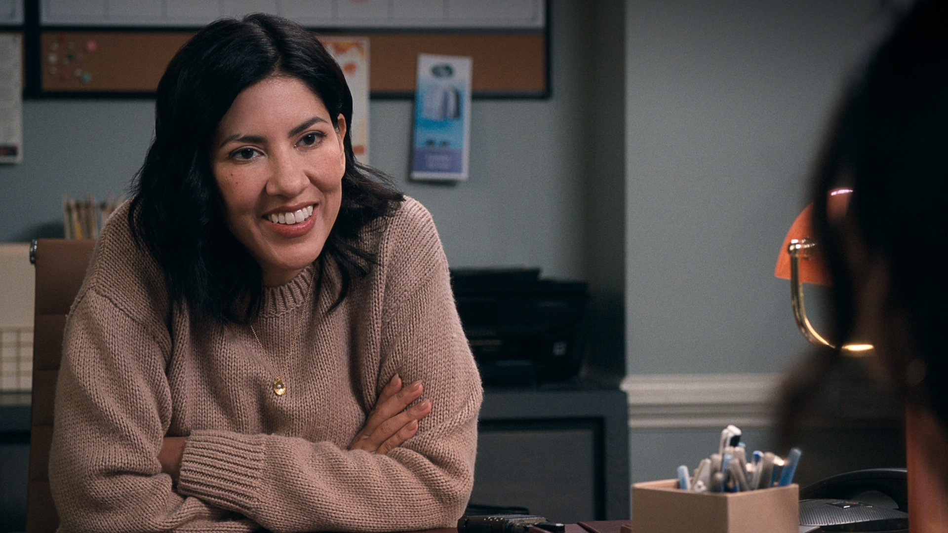 Didi smiles in A Man on the Inside season 2