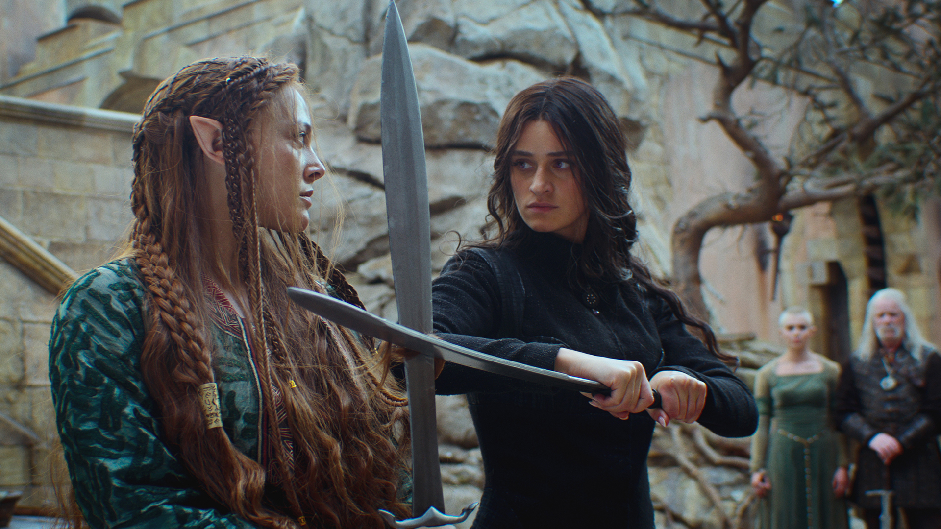Francesca and Yennefer look at each other with their swords locked together in The Witcher season 4