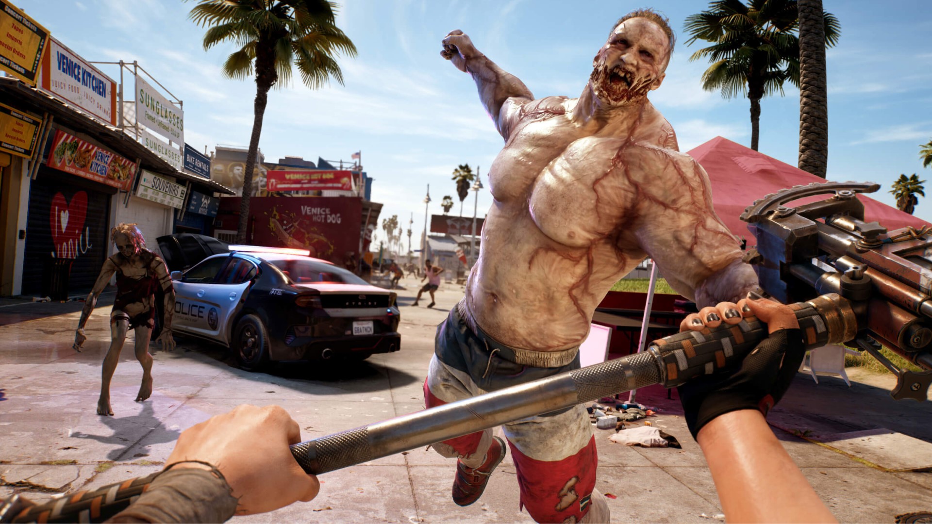 Dead Island 2 screenshot with a hammer and a massive zombie