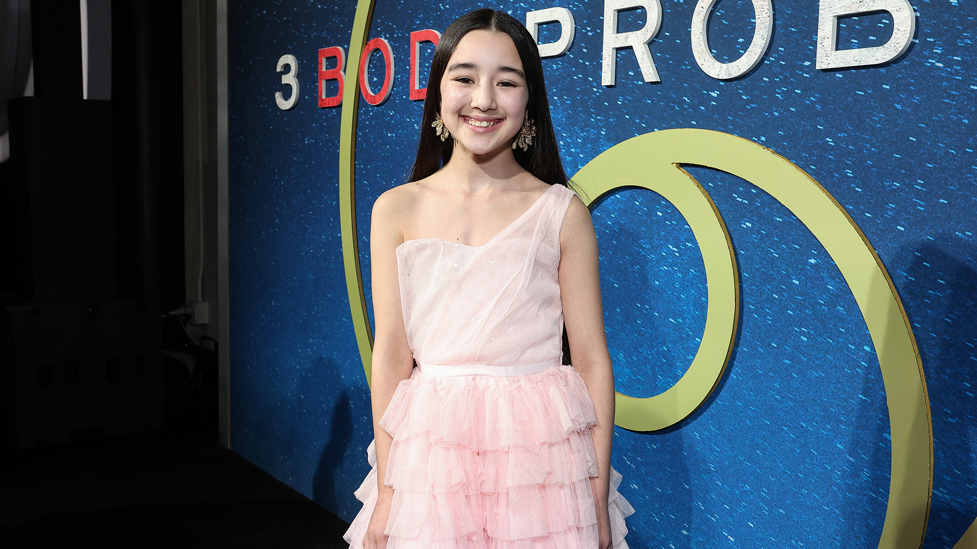 Eve Ridley posing for a photo during the premiere of the television series 3 Body Problem from Netflix