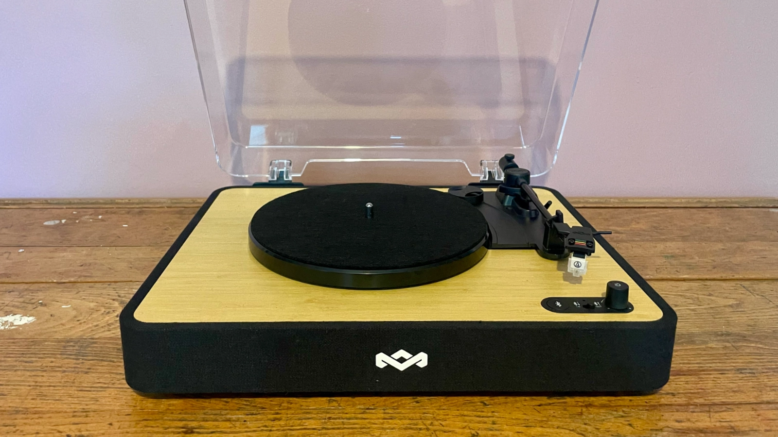 House of Marley Revolution turntable on a desk or wooden unit