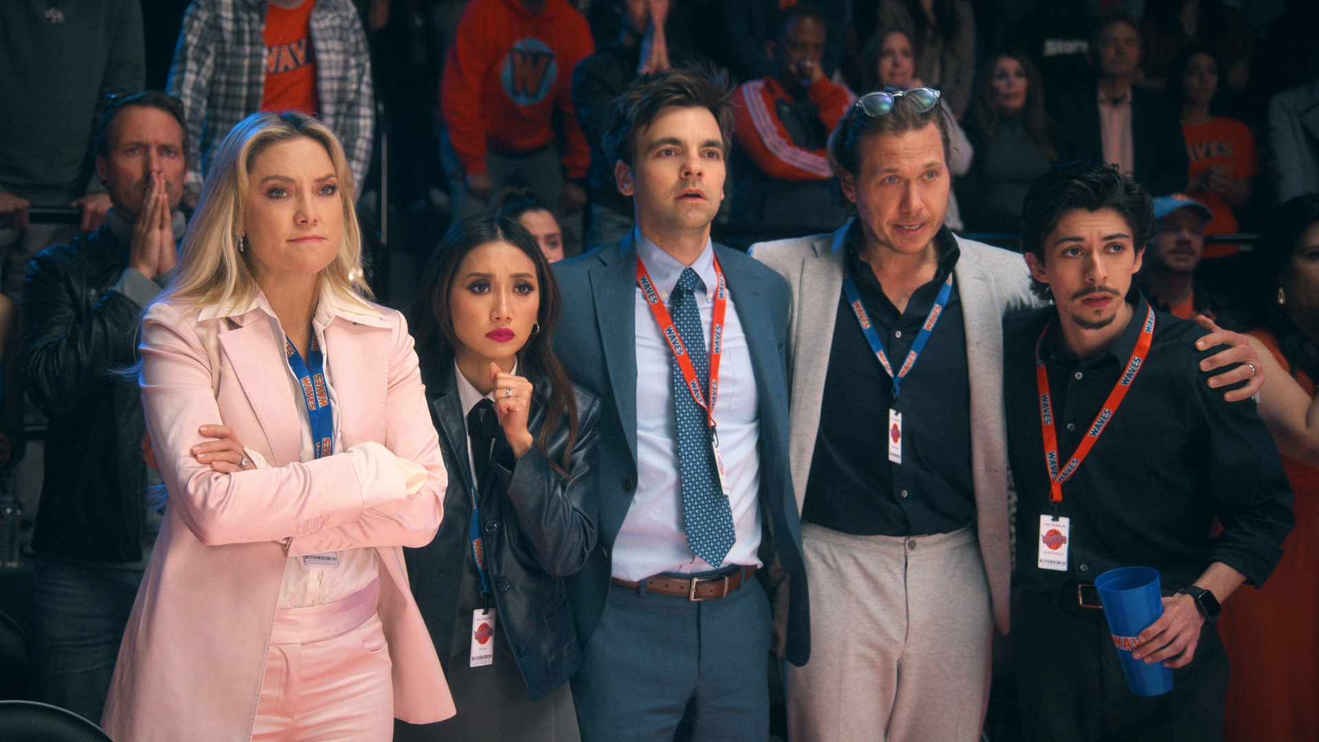 Isla and her team stand on the grounds of Running Point