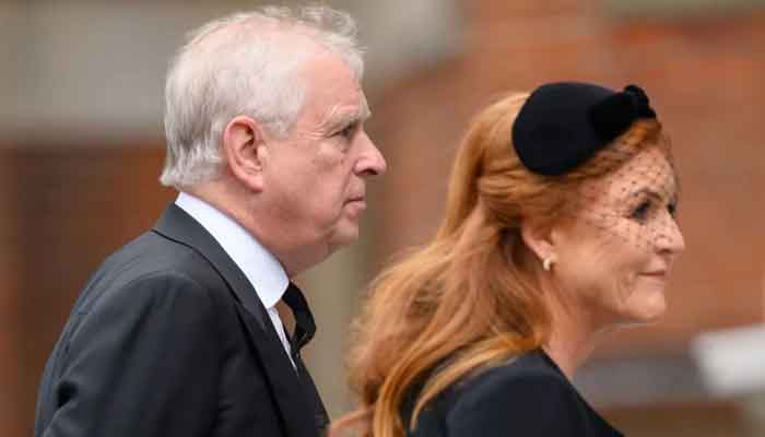 Andrew with his ex-wife Sarah Ferguson, who also lost her title as Duchess of York