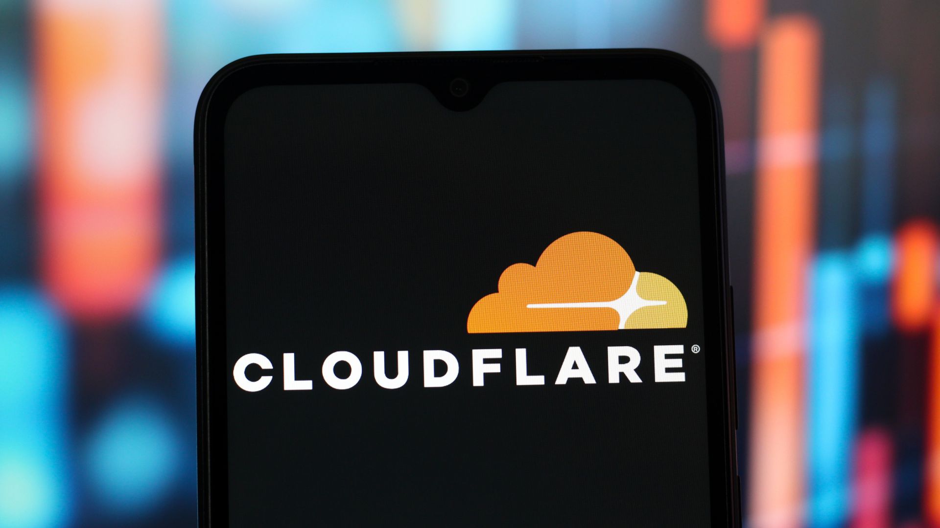 In this photo illustration, the Cloudflare logo is displayed on a smartphone screen.