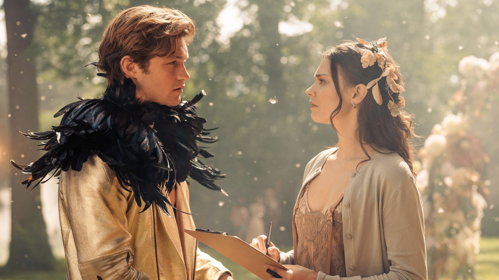 James and Ruby talk at a party