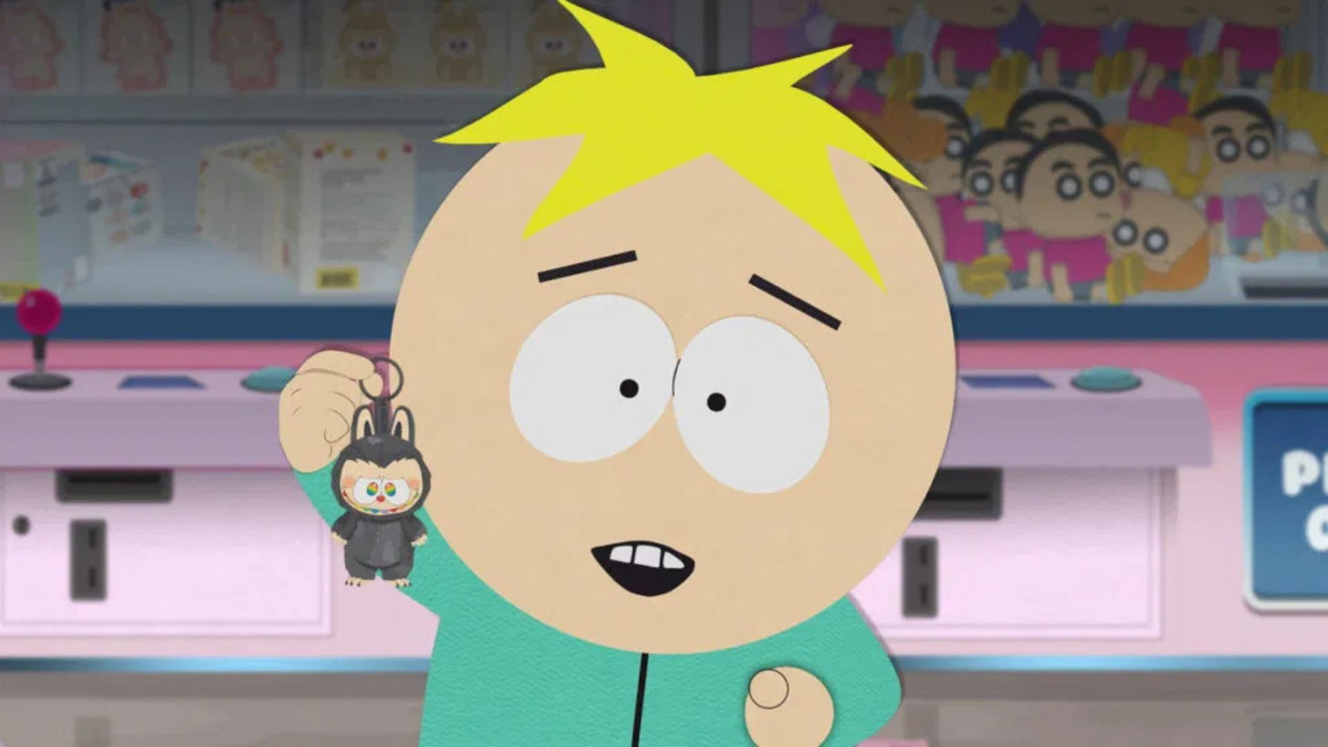 Butters is holding a Labubu keychain