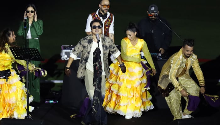 Pakistani star Ali Zafar performs during the ILT20 Season 4 opening ceremony on December 2, 2025. — Emirates Cricket Board