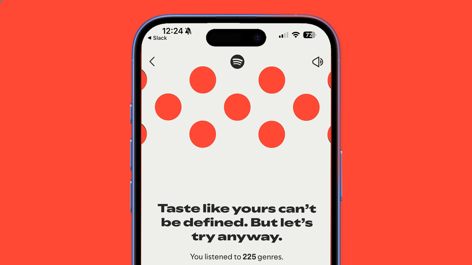 A phone on a red background displaying the Spotify web player