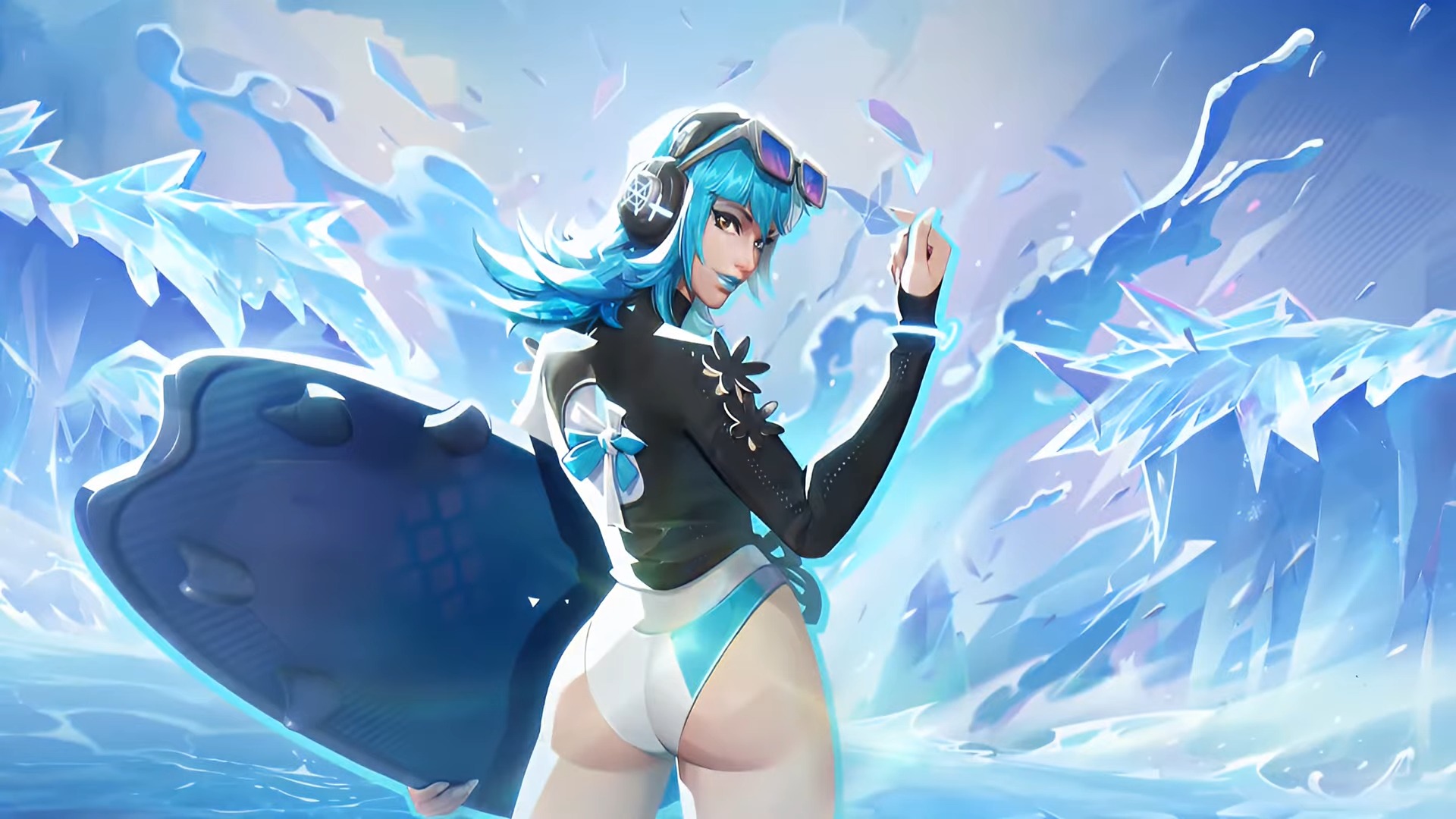 Luna Snow holds a surfboard and poses as waves crash in the background