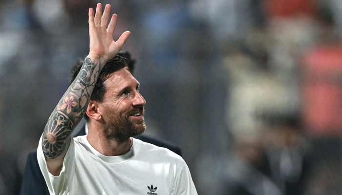 Argentine footballer Lionel Messi greets his supporters during his Goat Tour at the Wankhede stadium in Mumbai, December 14, 2025. — AFP