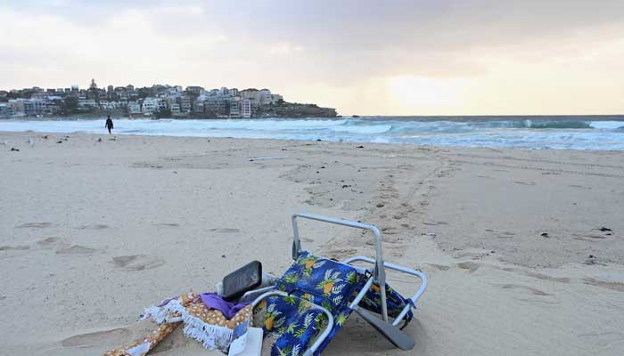 Objects lie on the sand after the attack on a Jewish party at Bondi Beach in Sydney, Australia, December 15, 2025. — Reuters