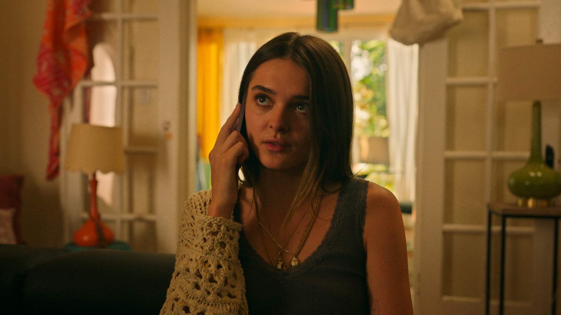 Caitlin talks on the phone in Bad Monkey