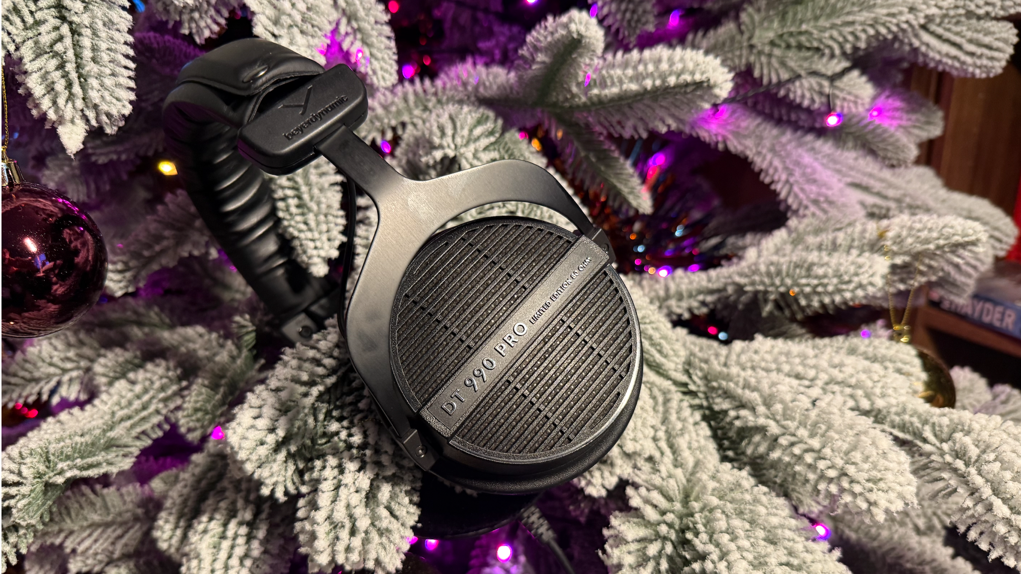The Beyerdynamic DT 990 Pro hanging on a Christmas tree