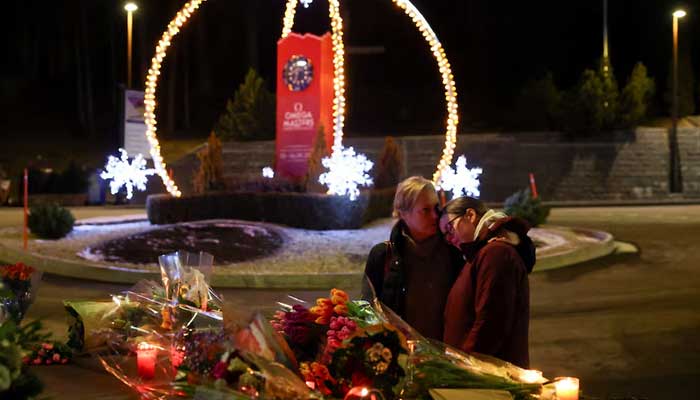 People embrace near the Le Constellation bar, after a fire and explosion during a New Year's Eve party left several people dead in the upscale ski resort of Crans-Montana, in southwest Switzerland, January 1, 2026. — Reuters
