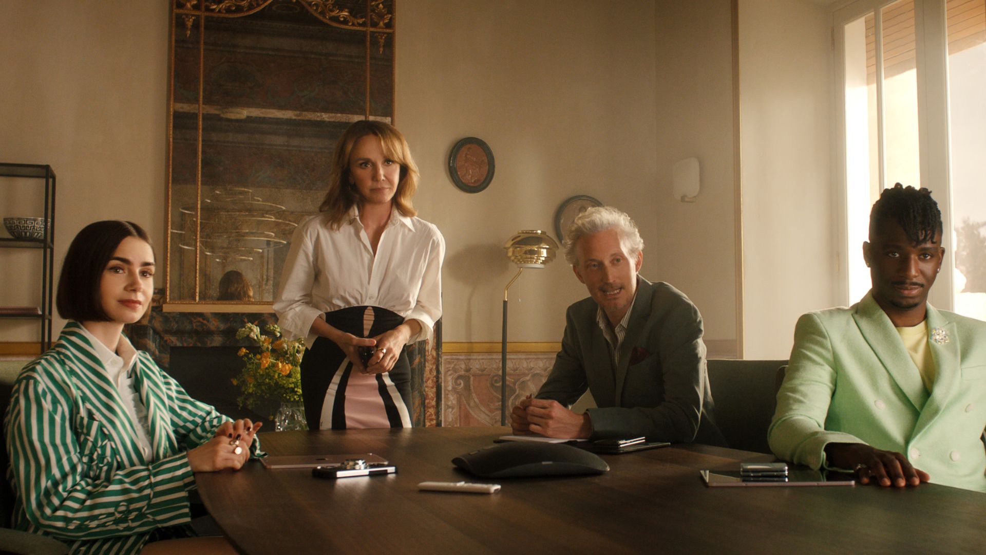 The Grateau Agency sits in a meeting room