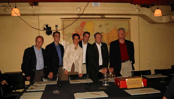 Former U.S. President Bill Clinton and Ghislaine Maxwell are seen in this image from the estate of late financier and convicted sex offender Jeffrey Epstein, released by the Department of Justice in Washington, DC, U.S., December 19, 2025. — Reuters