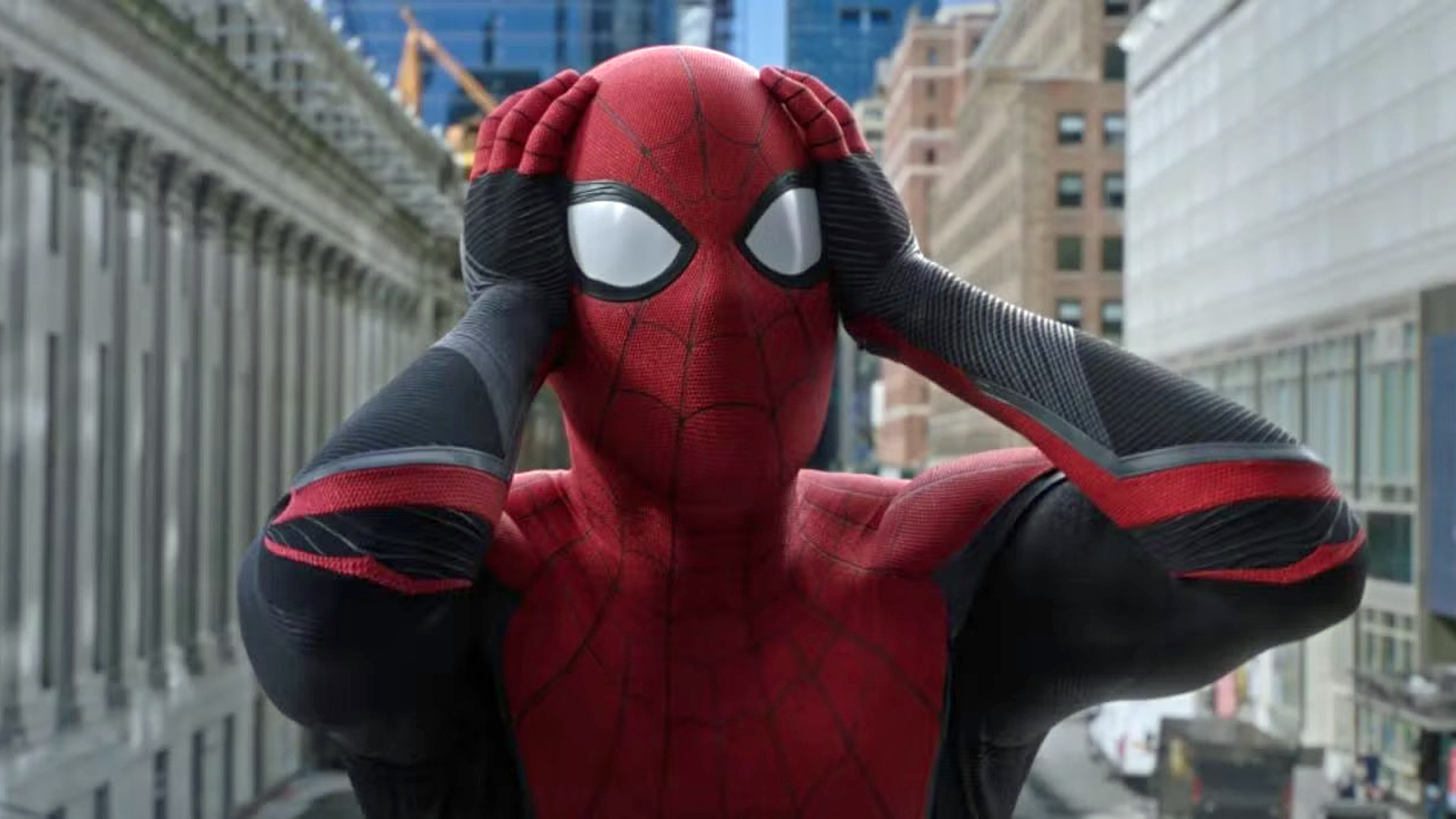 Spider-Man puts his hands to his head in shock in Spider-Man: Far From Home