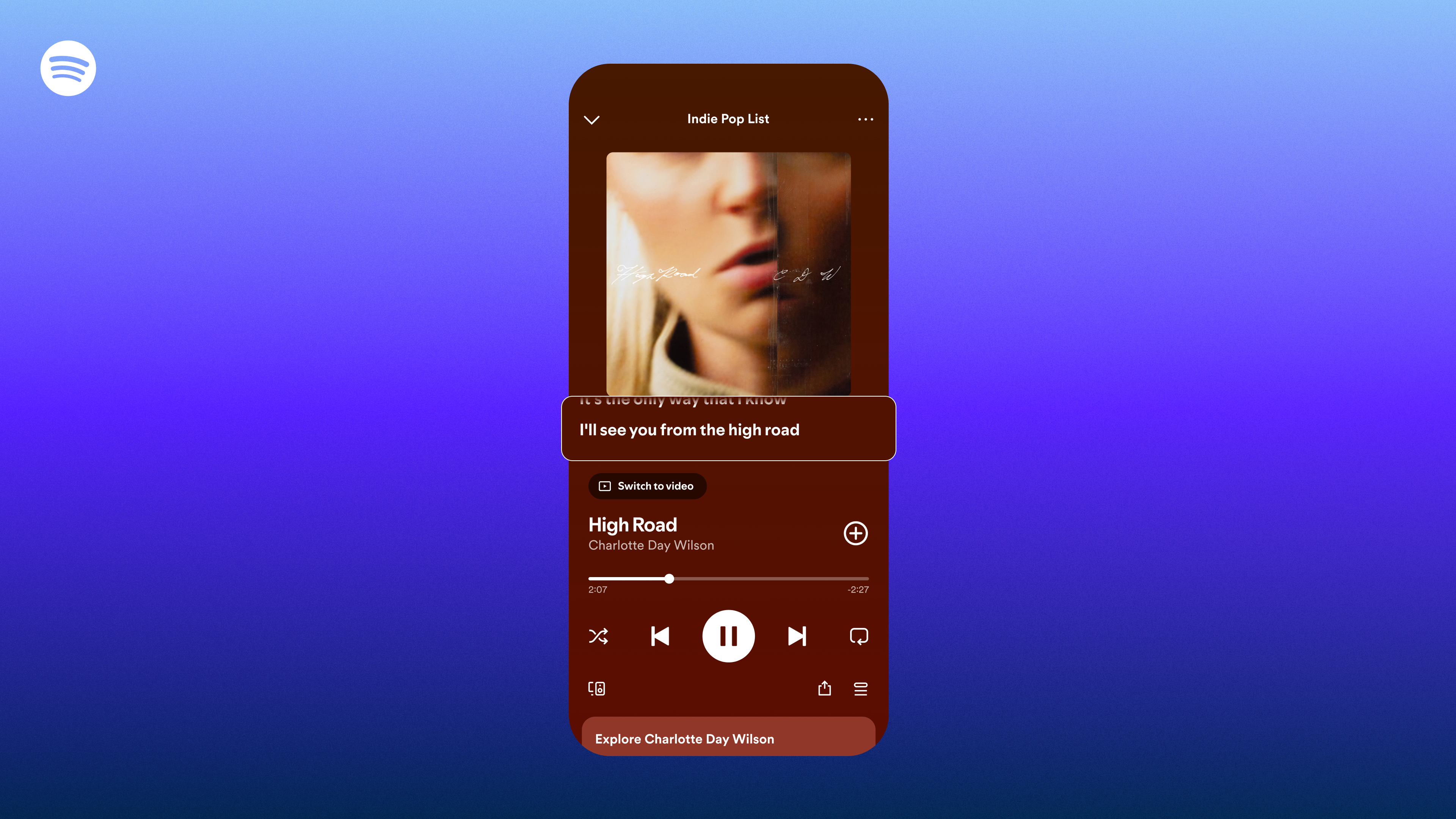 A smartphone showing the new Lyrics tab on the Spotify playing page