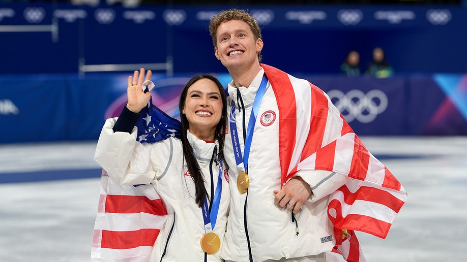 Madison Chock and Evan Bates pose