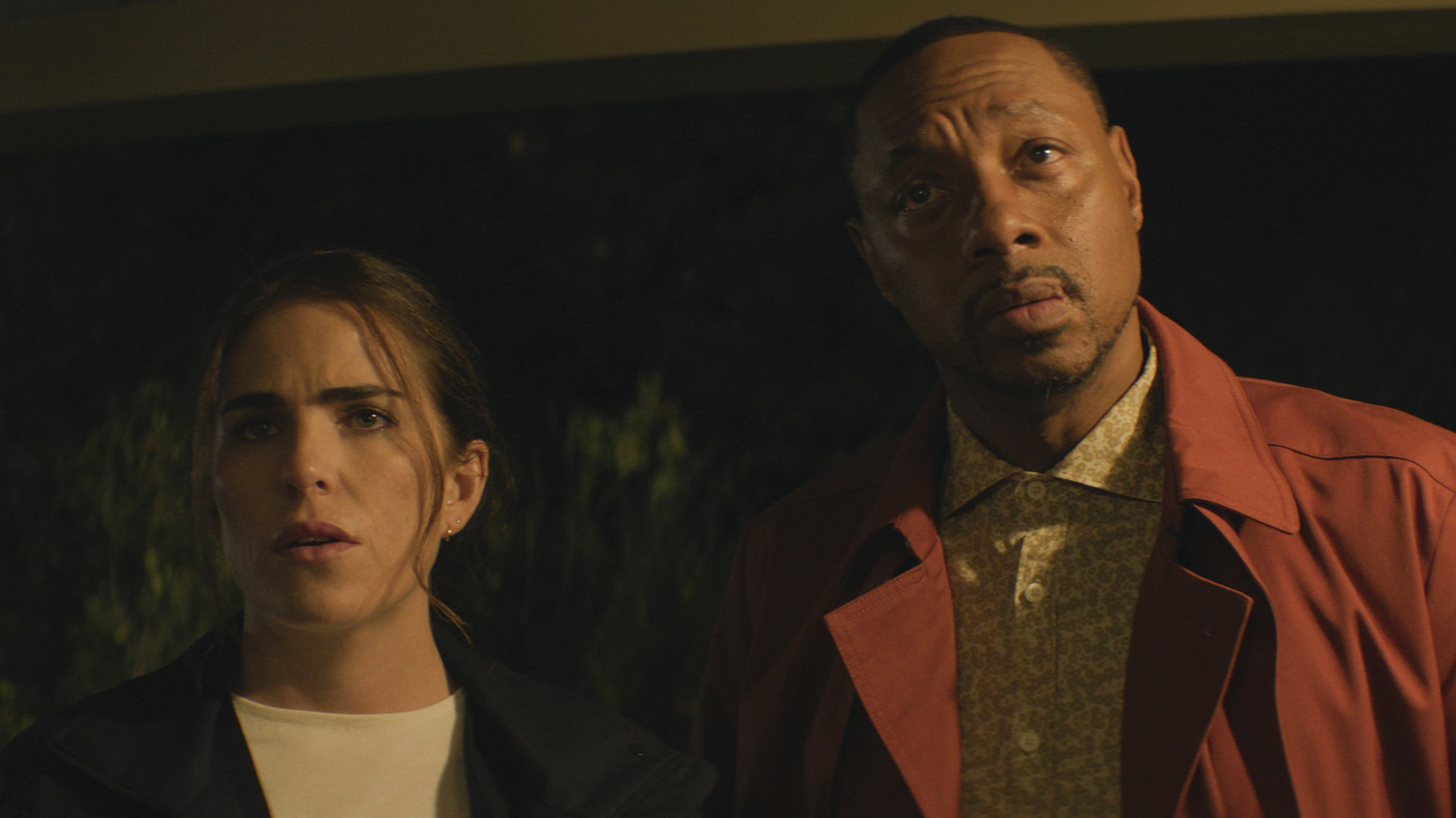 Lee and Karl watch something that happens off camera in 56 Days