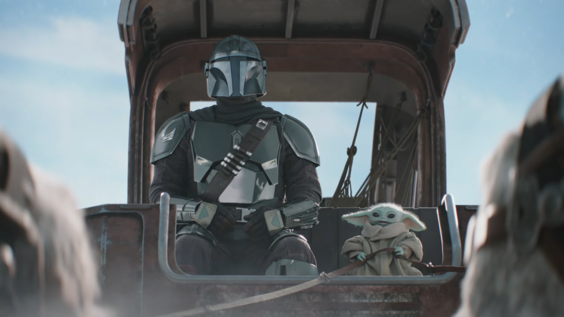 Din Djarin and Baby Yoda sit in a sleigh pulled by Tauntauns in The Mandalorian and Grogu Super Bowl 2026 TV spot
