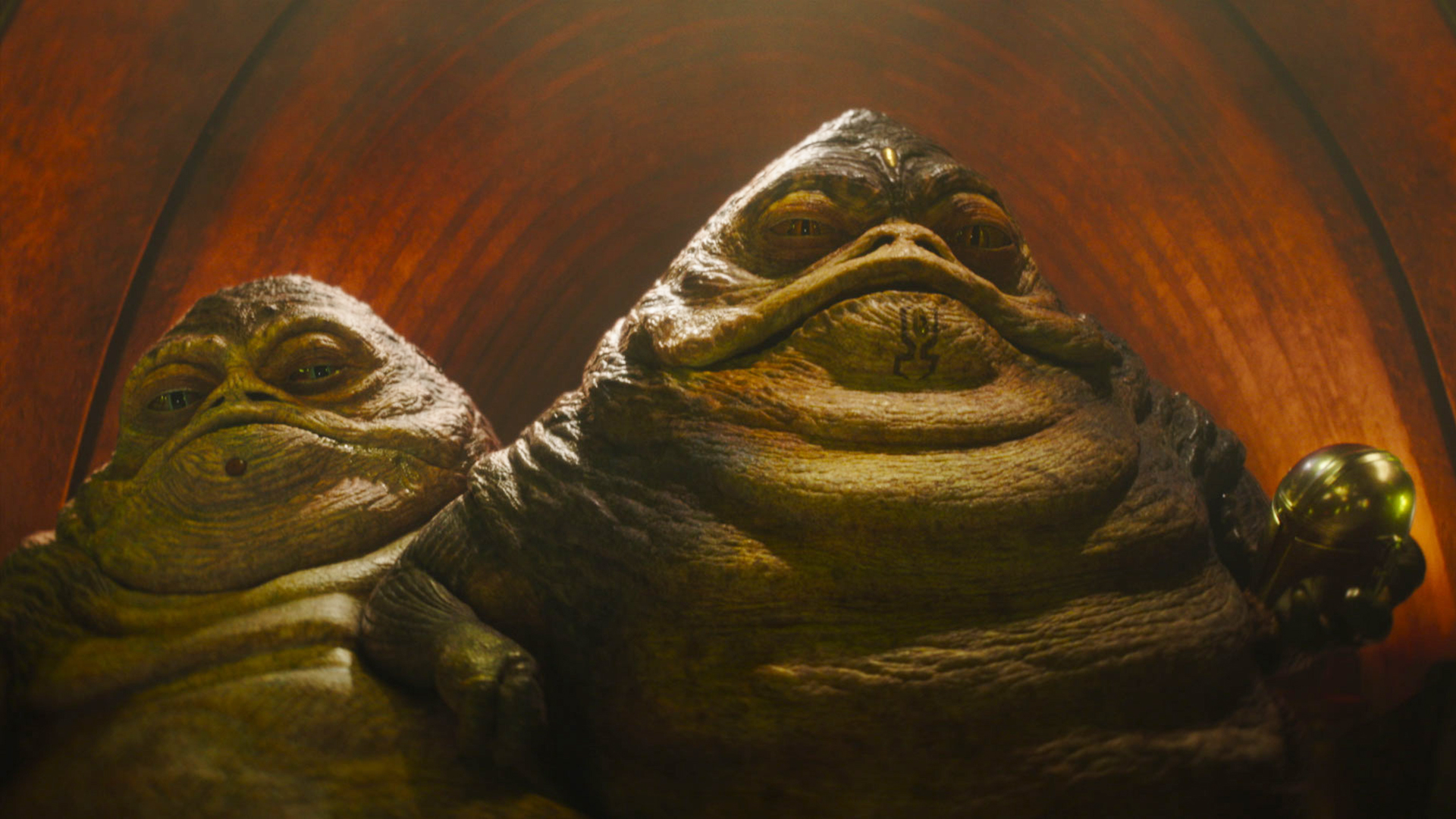 Hutt Sister and Brother Watching Din Djarin Off-Camera in The Mandalorian and Grogu