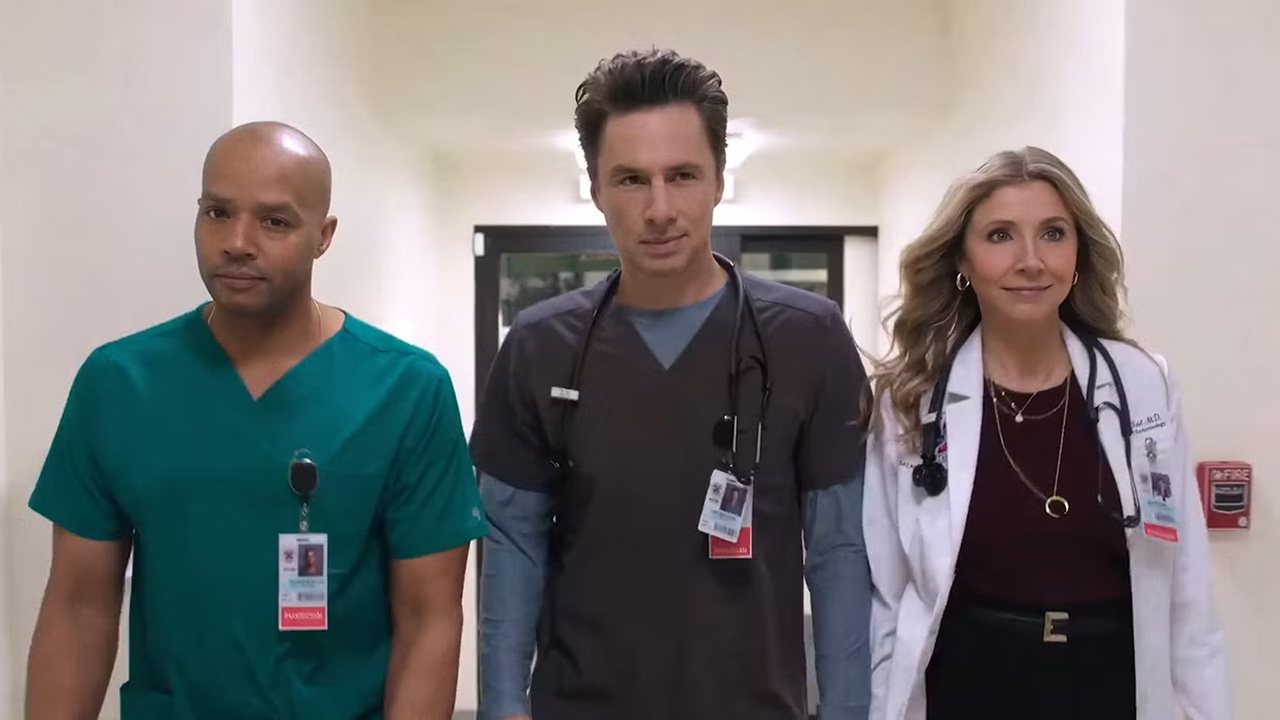 Turk, JD and Elliot walking down a hospital corridor in season 10 of Scrubs