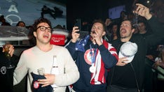 Team USA men's hockey players sing the national anthem while partying at the famous Miami nightclub